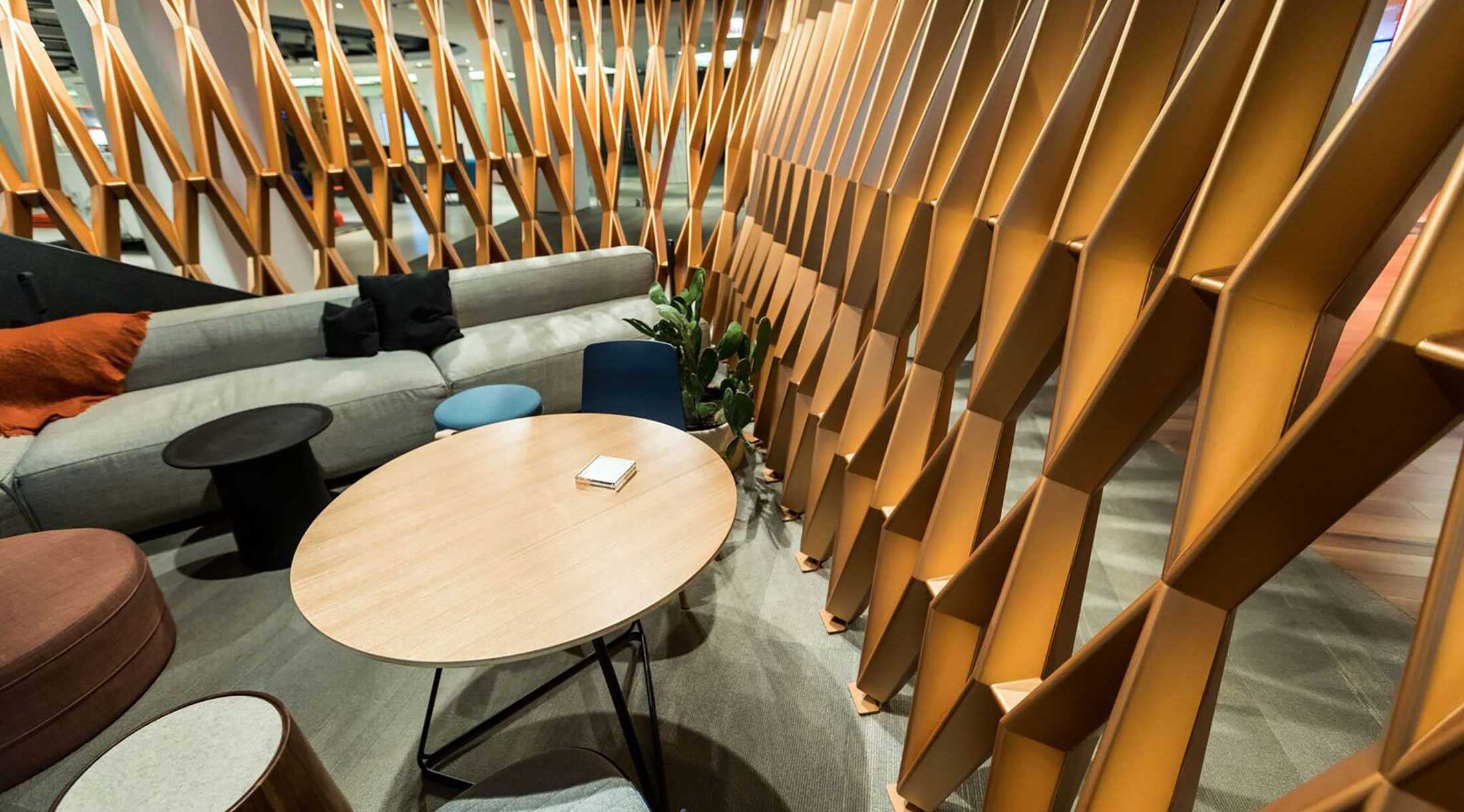 A room with wooden walls and furniture in it