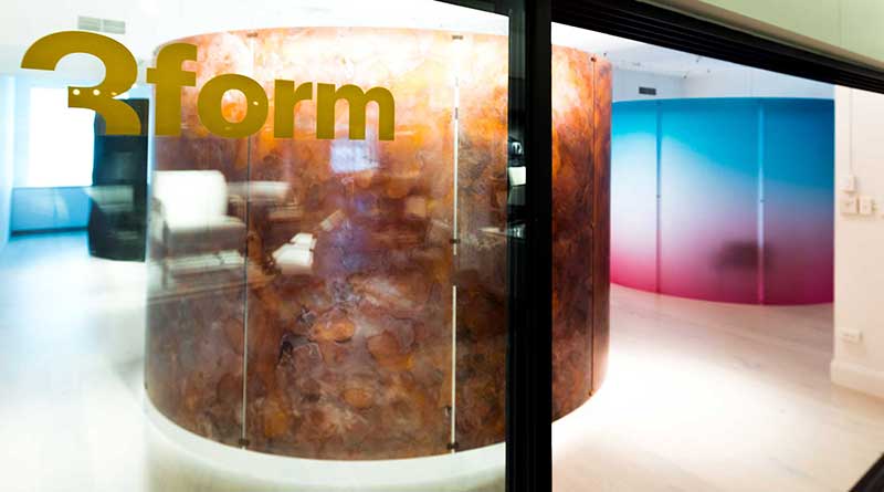 A room with a large round brown and yellow sign.
