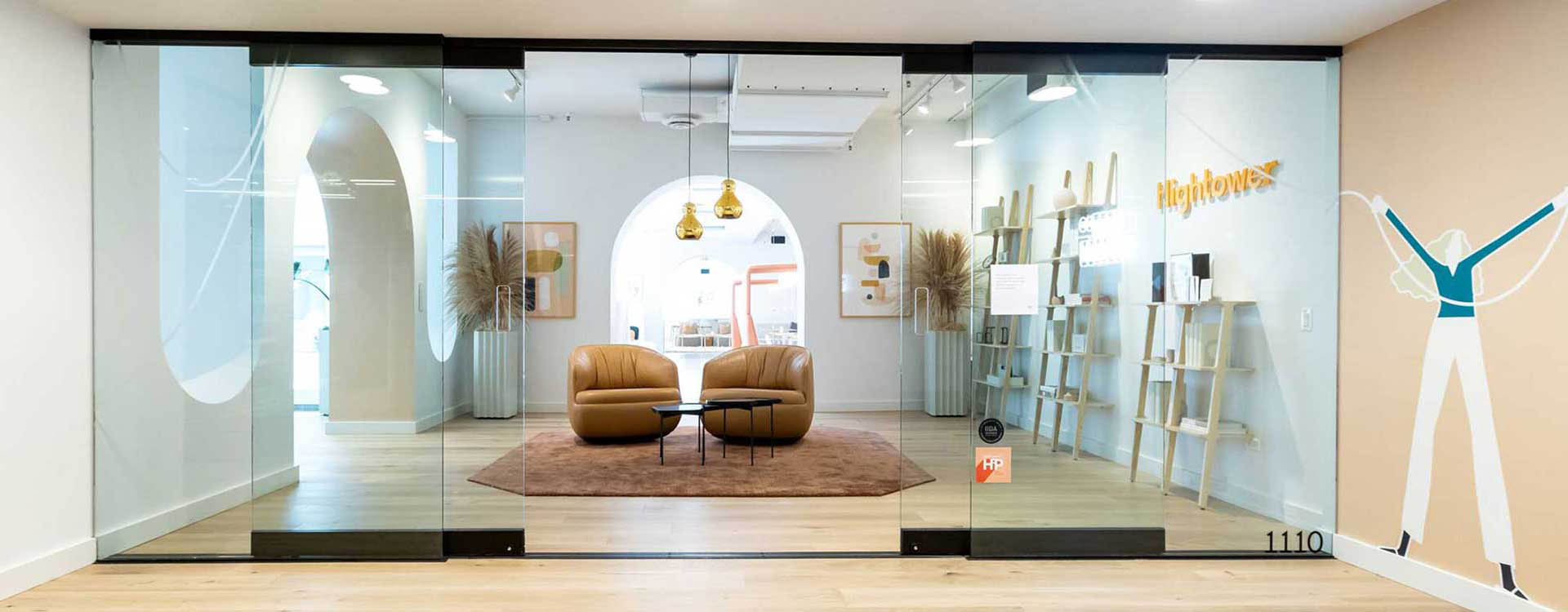A room with two chairs and a table in it