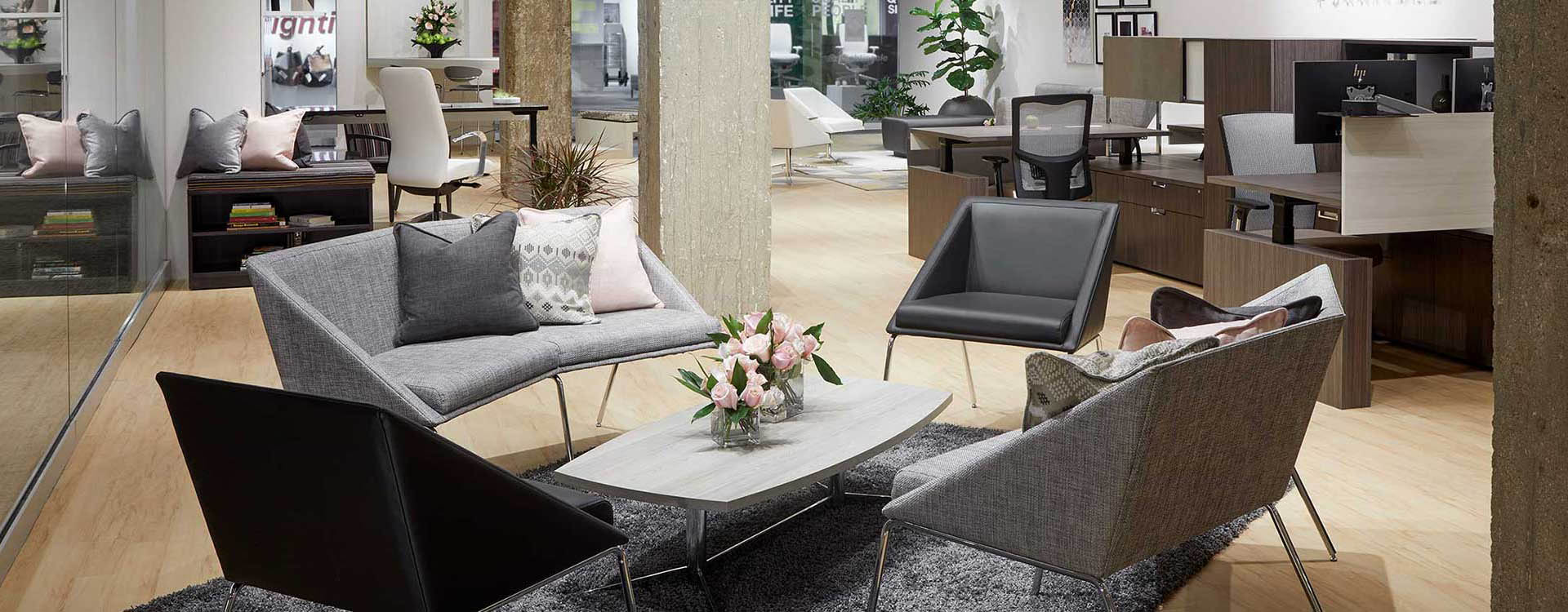 A living room with couches and tables in it