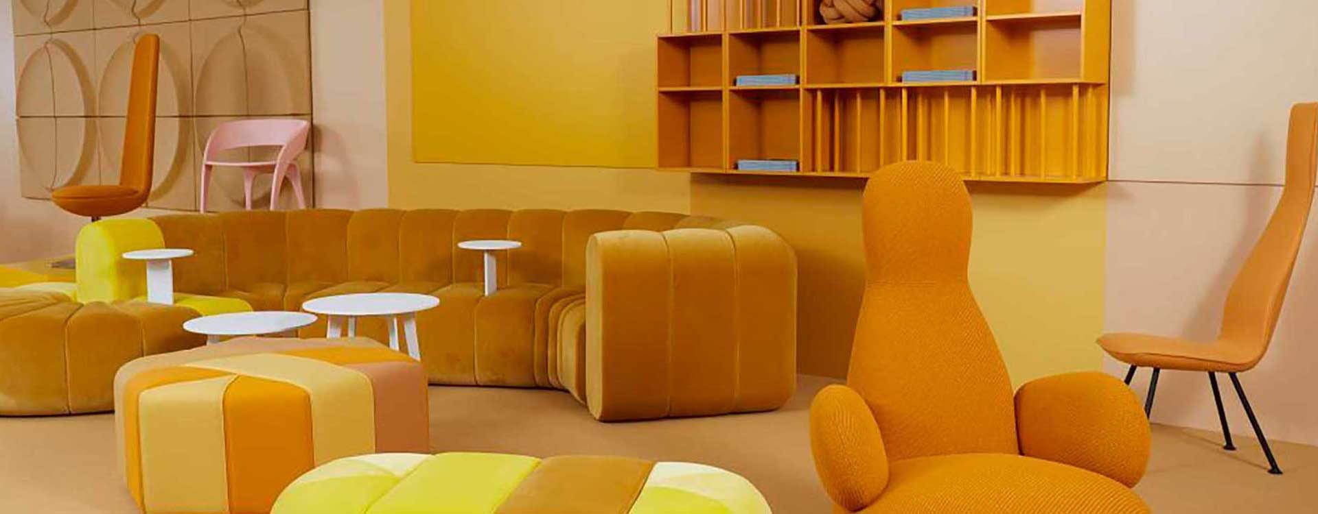 A room with yellow walls and furniture.