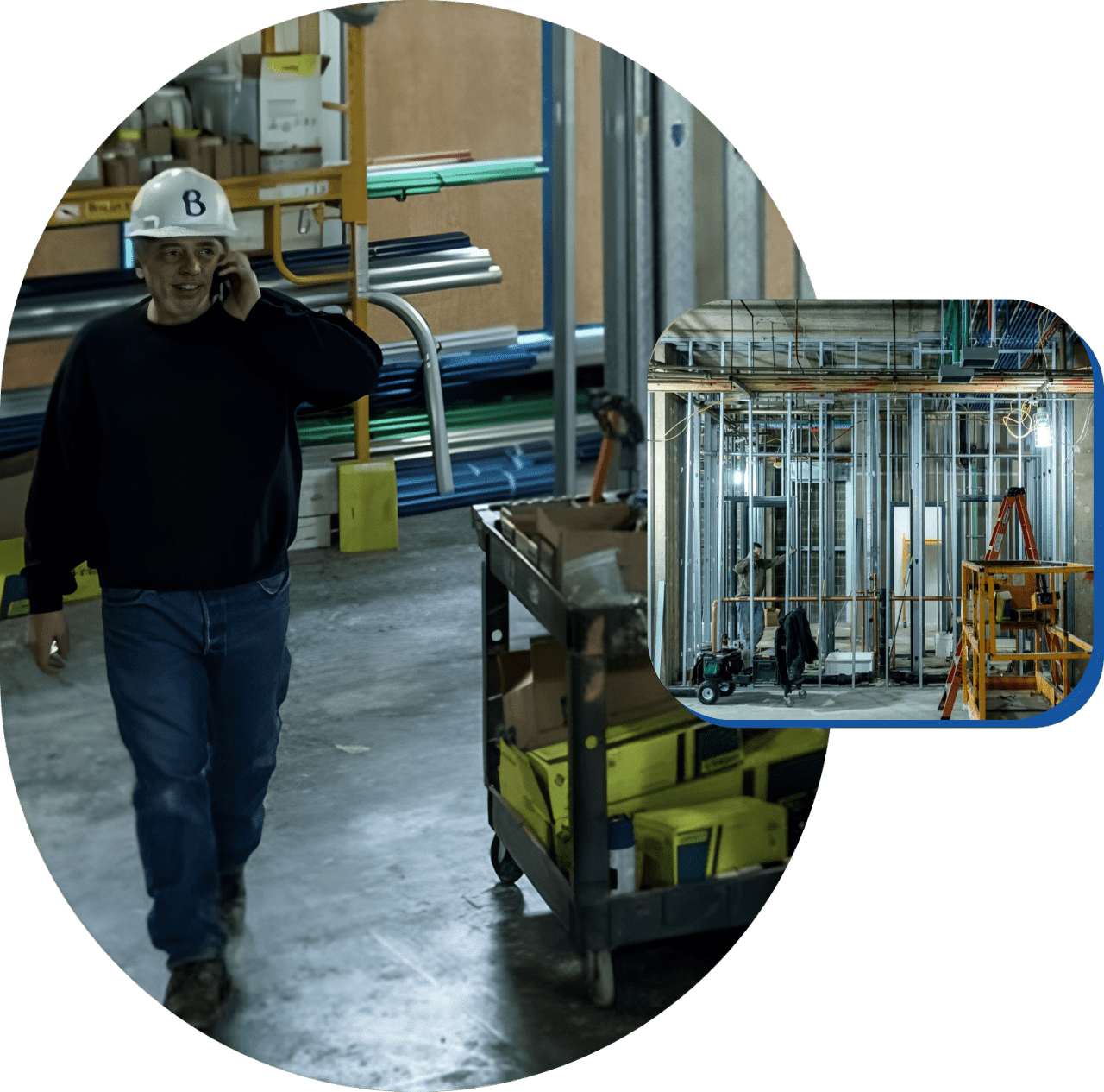 A man in hard hat walking through an industrial setting.